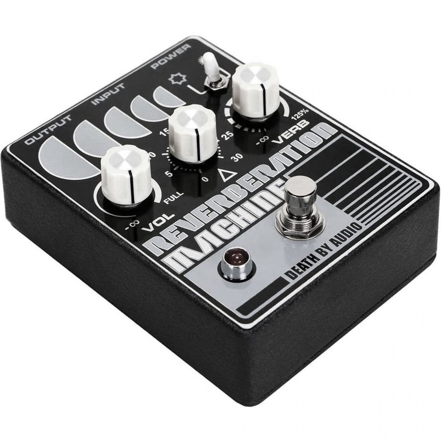 Death by Audio Reverberation Machine pedal from the front right, showing the three silver knobs and the toggle switch