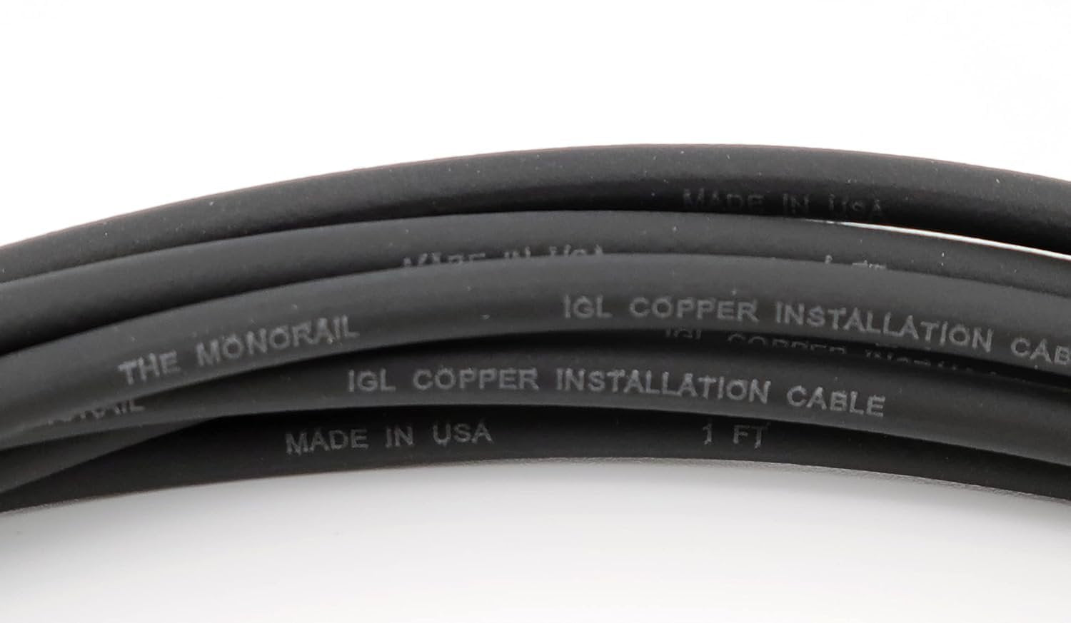 Close-up of Evidence Audio Monorail cable jacket text, black (8plugs, 5 ft)