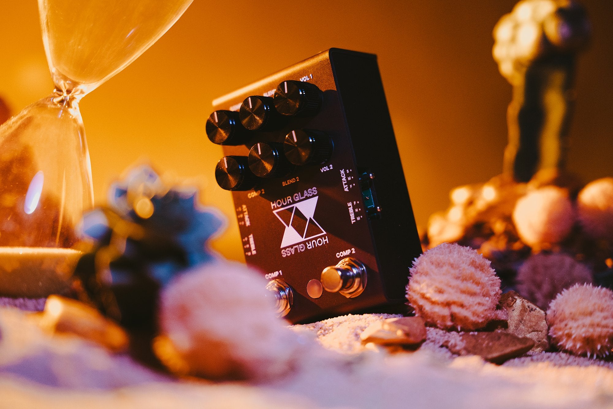 Jackson Audio Hour Glass Analog Dual Compressor Pedal, Surreal desert lifestyle graphic featuring an hourglass motif for the Hour Glass compressor.