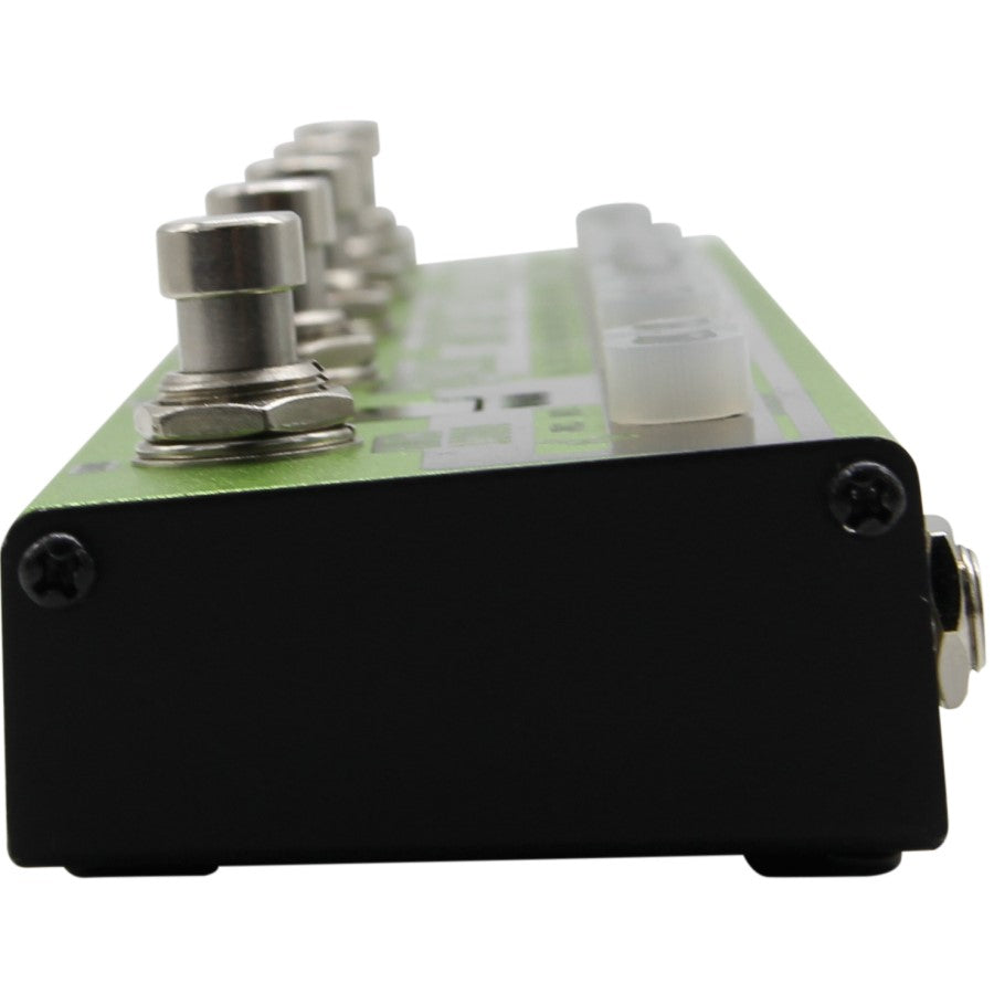 Close-up of Valeton Dapper Bass strip input and output jacks