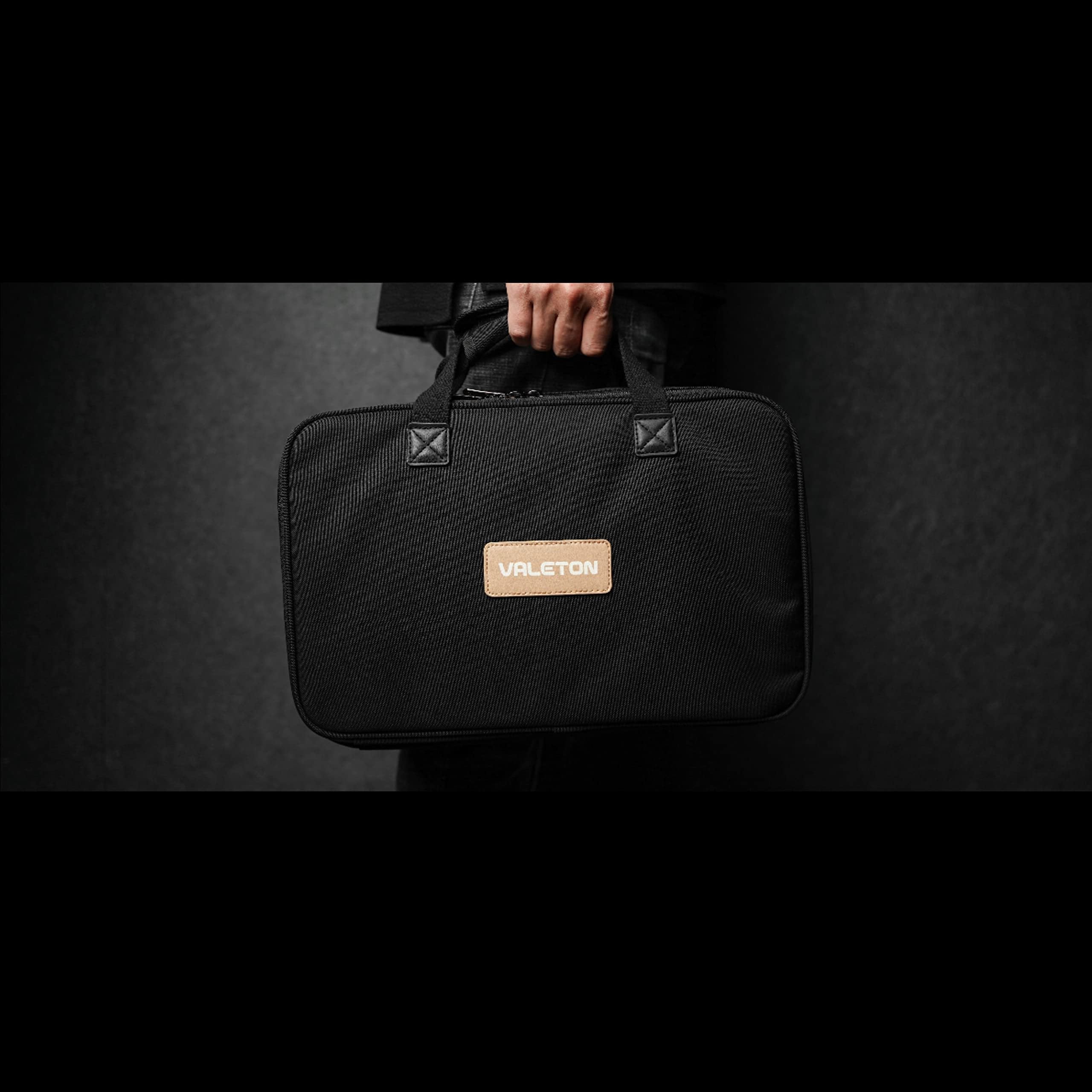 Hand carrying the black Valeton gig bag included with the GP-200 bundle