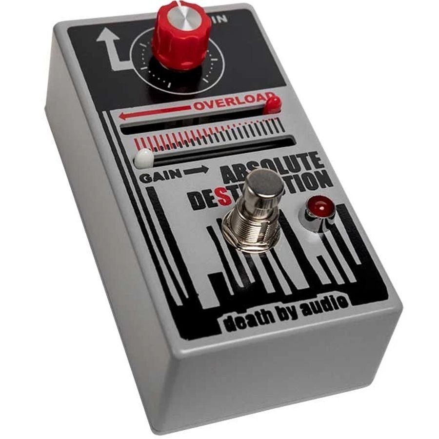 Death by Audio Absolute Destruction pedal from the front left, with the OVERLOAD and GAIN slider tracks and red control knob in view