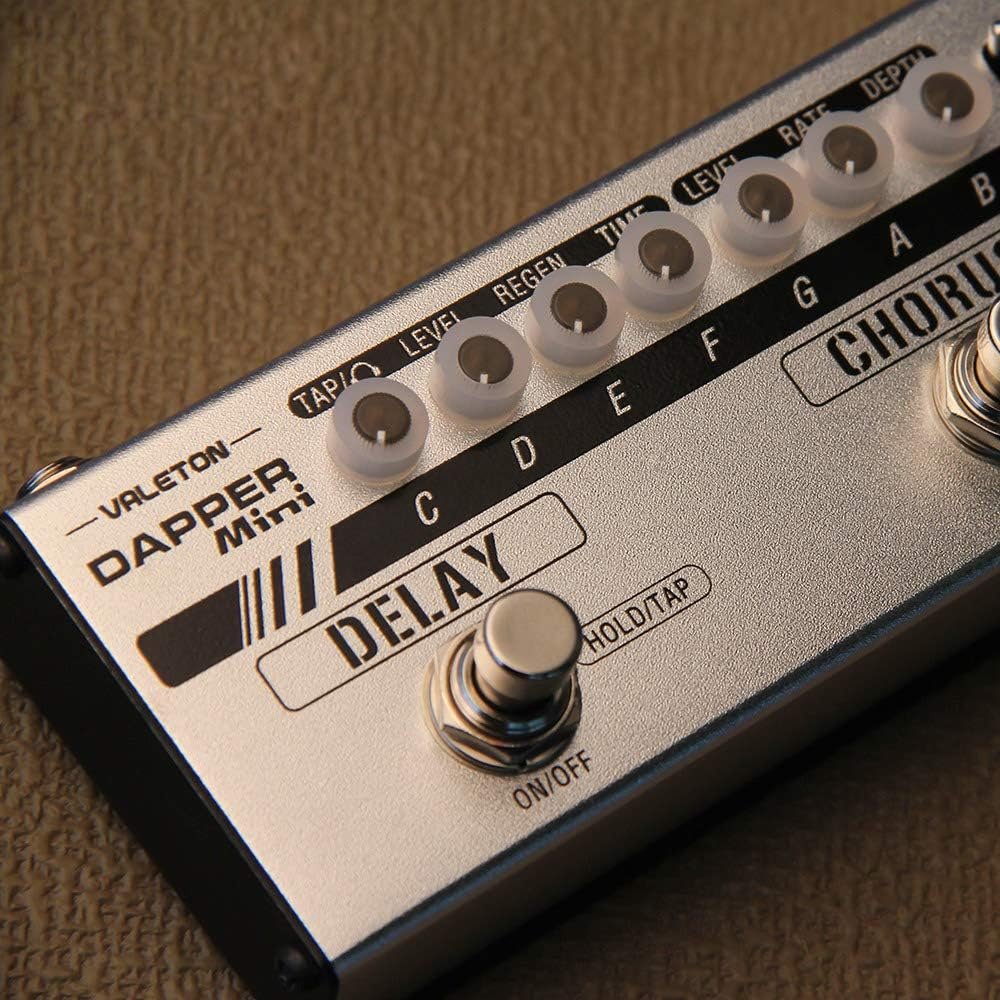 Close-up of Valeton Dapper Mini Delay module knobs and footswitch